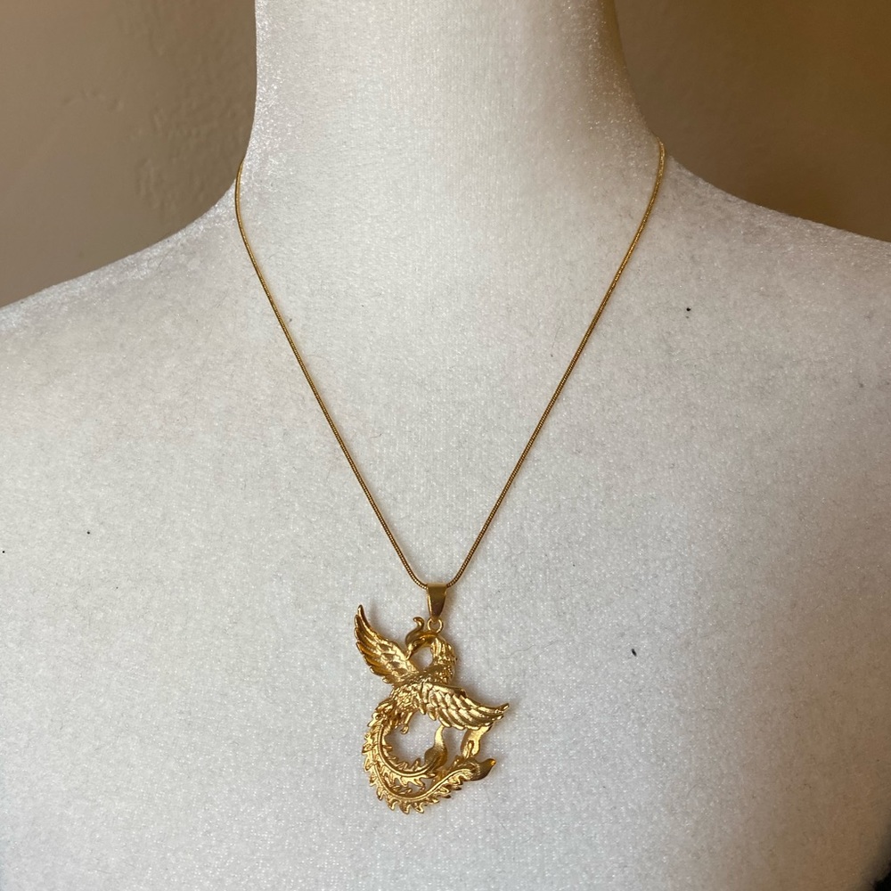 bold gold phoenix pendant necklace